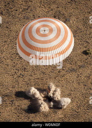The Soyuz TMA-21 spacecraft is seen as it lands with Expedition 28 Commander Andrey Borisenko, and Flight Engineers Ron Garan, and Alexander Samokutyaev in a remote area outside of the town of Zhezkazgan, Kazakhstan, on Friday, September 16, 2011. NASA Astronaut Garan, Russian Cosmonauts Borisenko and Samokutyaev are returning from more than five months onboard the International Space Station where they served as members of the Expedition 27 and 28 crews.  UPI/Bill Ingalls/NASA Stock Photo