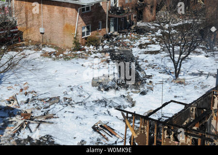 Firefighting foam covers the scene of a crash of an Navy F/A-18D Hornet, assigned to Strike Fighter Squadron (VFA) 106, April 6, 2012 In Virginia Beach, Virginia. The jet crashed just after takeoff  into an apartment complex. Both air crew safely ejected from the aircraft and are being treated at a local hospital. Nobody on the ground was killed. UPI/MC3 Antonio P. Turretto Ramos/Navy Stock Photo