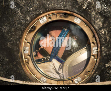 Expedition 40 Flight Engineer Oleg Artemyev of the Russian Federal Space Agency (Roscosmos) looks out the window of the Soyuz Capsule just minutes after he and Flight Engineer Alexander Skvortsov of Roscosmos, and, Commander Steve Swanson of NASA, landed in their Soyuz TMA-12M capsule in a remote area near the town of Zhezkazgan, Kazakhstan on September 11, 2014. Artemyev, Skvortsov and Swanson returned to Earth after more than five months onboard the International Space Station where they served as members of the Expedition 39 and 40 crews.      UPI/Bill IngallsNASA Stock Photo