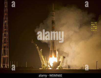 The Soyuz TMA-16M spacecraft is seen as it launches to the International Space Station with Expedition 43 NASA Astronaut Scott Kelly, Russian Cosmonauts Mikhail Kornienko, and Gennady Padalka of the Russian Federal Space Agency (Roscosmos) onboard Saturday, March 28, 2015, Kazakh time (March 27 Eastern time) from the Baikonur Cosmodrome in Kazakhstan. As the one-year crew, Kelly and Kornienko will return to Earth on Soyuz TMA-18M in March 2016. NASA Photo by Bill Ingalls/UPI Stock Photo