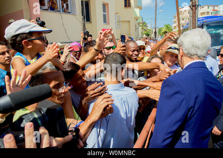 US Secretary of State John Kerry greets Cubans across the street after a ceremony reopening the US Embassy in Havana, Cuba on August 14, 2015. Kerry's visit is the first by a Secretary of State in 70 years. The Embassy has been closed for 54 years.     Photo by US Department of State/UPI Stock Photo