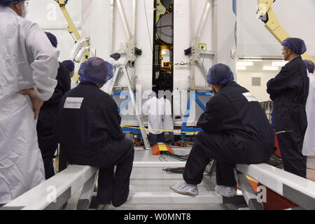 In the SpaceX Payload Processing Facility at Vandenberg Air Force Base on January 11, 2016, the Jason-3 satellite is prepared for encapsulation in its payload faring. Once the encapsulating is complete, it will be mated to a SpaceX Falcon 9 rocket at Vandenberg's Space Launch Complex 4. Jason-3, an international mission led by the National Oceanic and Atmospheric Administration (NOAA), will help continue U.S.-European satellite measurements of global ocean height changes.    NASA/UPI Stock Photo