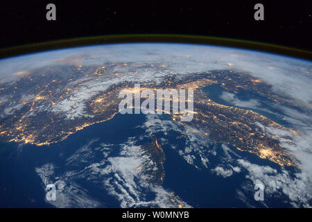 Expedition 46 flight engineer Tim Peake of the European Space Agency (ESA) shared this stunning nighttime photograph with his social media followers on January 25, 2016, writing, 'Beautiful night pass over Italy, Alps and Mediterranean.' UPI Stock Photo