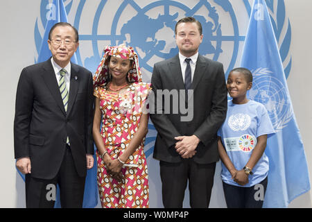 United Nations Secretary-General Ban Ki-moon meets with the three speakers who addressed the opening segment of the Paris Agreement on Climate Change signing ceremony: Hindou Oumarou Ibrahim (from Chad), civil society representative; UN Messenger of Peace (with a special focus on climate change) Leonardo DiCaprio; and Gertrude Clement, 16-year-old radio reporter from Tanzania and youth representative and climate advocate with the UN Children's Fund (UNICEF) at the United Nations in New York on April 22, 2016. These individuals were just a handful of the many high profile guests and world leade Stock Photo