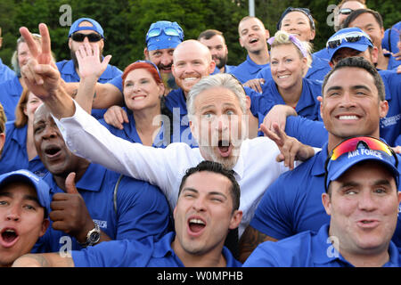 Television and movie personality Jon Stewart, most notably of The Daily Show, poses for a photo with the Air Force team for the 2016 Department of Defense Warrior Games on June 15, 2016. Stewart emceed the opening ceremonies for the games. Photo by EJ Hersom/Department of Defense/UPI Stock Photo