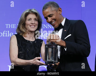 Former U.S. President Barack Obama is presented the 2017 John F. Kennedy Profile In Courage Award by Caroline Kennedy at the John F. Kennedy Library in Boston, Massachusetts on May 7, 2017. Obama is being honored for 'his enduring commitment to democratic ideals and elevating the standard of political courage in a new century,' with specific mention of his expansion of healthcare options, his leadership on confronting climate change and his restoration of diplomatic relations with Cuba.      Photo by CJ Gunther/UPI Stock Photo