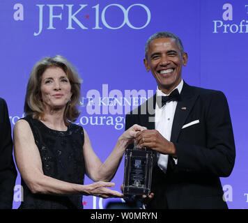 Former U.S. President Barack Obama is presented the 2017 John F. Kennedy Profile In Courage Award by Caroline Kennedy at the John F. Kennedy Library in Boston, Massachusetts on May 7, 2017. Obama is being honored for 'his enduring commitment to democratic ideals and elevating the standard of political courage in a new century,' with specific mention of his expansion of healthcare options, his leadership on confronting climate change and his restoration of diplomatic relations with Cuba.      Photo by CJ Gunther/UPI Stock Photo