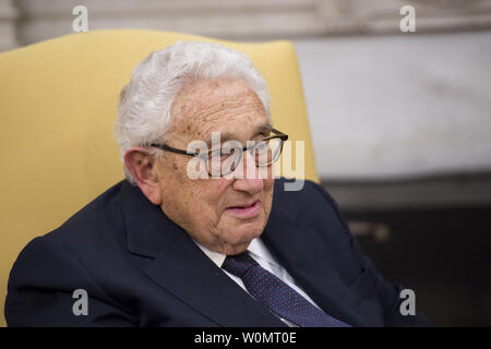 President Donald Trump meets former Secretary of State Henry Kissinger in the Oval Office at the White House.   Photo by Molly Riley/UPI Stock Photo