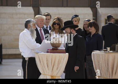 US President Donald Trump, First Lady Melania Trump and his daughter Ivanka and son in law during a visit to the Western Wall , the most sacred holy site for Jews, in the Old City of Jerusalem ON May 22, 2017. Trump arrived in Israel today from Saudi Arabia ,where he will attempt to revive the stalled Israeli-Palestinain peace process during his visit to Jerusalem and the West Bank.    Photo by Heidi Levine/UPI Stock Photo