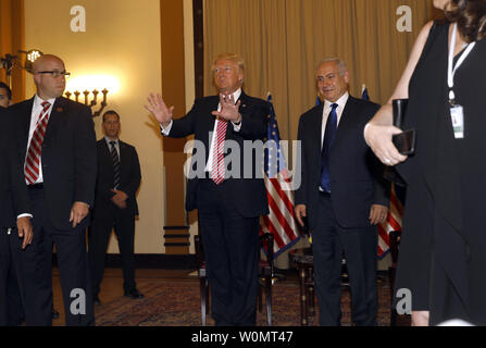 US President Donald Trump gestures next to Israel's Prime Minister Benjamin Netanyahu during a meeting in Jerusalem on May 22, 2017. Photo by Menahem Kahana Stock Photo