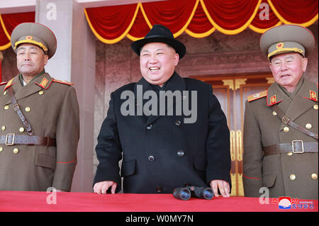 This image released on February 8, 2018, by the North Korean Official News Service (KCNA), shows North Korean leader Kim Jong Un watching on as troops marched through Kim Il Sung Square in a show of military might on the eve of the  2018 Winter Olympics in Pyeongchang, South Korea. Photo by KCNA/UPI Stock Photo