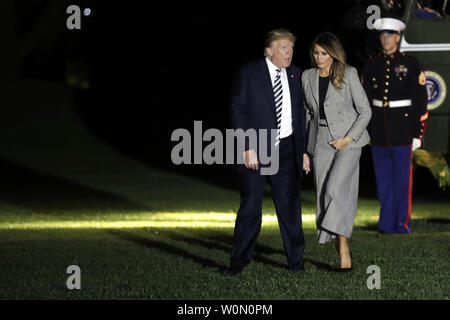 U.S. President Donald Trump and First Lady Melania Trump walk on the South Lawn of the White House upon return from Joint Base Andrews in Washington, D.C., U.S., on Thursday, May 10, 2018. North Korea released the three U.S. citizens who had been detained for as long as two years, a goodwill gesture ahead of a planned summit between Trump and Kim Jong Un that's expected in the coming weeks. Photo by Yuri Gripas/UPI