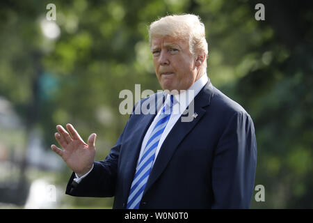 US President Donald Trump waves as he walks on South Lawn of the White House on May 14, 2018 in Washington, DC before his departure to Walter Reed in Maryland. Photo by Yuri Gripas/UPI Stock Photo