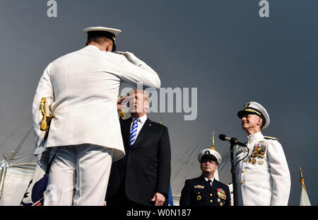 U.S. President Donald Trump participates in the U.S. Coast Guard Change-of-Command Ceremony as Adm. Paul F. Zukunft  (R) is  relieved by Adm. Karl L. Schultz (L) as commandant.on June 1, 2018 at the U.S. Coast Guard Headquarters in Maryland.  Photo by Olivier Douliery/UPI Stock Photo