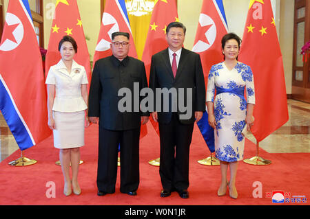 This image released on June 20, 2018, by the North Korean Official News Service (KCNA), shows North Korean leader Kim Jong Un visiting Chinese President Xi Jinping in Beijing to discuss the denuclearization of the Korean peninsula following last week's meeting with U.S. President Donald Trump in Singapore. Kim's wife, Ri Sol Ju, accompanied the leader on his visit to China. Photo by KCNA/UPI Stock Photo