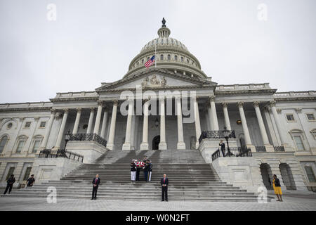 Joint service members of a military casket team carry the casket of Senator John McCain from the US Capitol to a motorcade that will ferry him to a funeral service at the National Cathedral in Washington, DC, on Saturday, September 1, 2018. McCain, an Arizona Republican, presidential candidate, and war hero, died August 25th at the age of 81 after a battle with brain cancer.     Photo by Jim Lo Scalzo/UPI Stock Photo