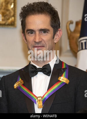 Andy Blankenbuehler, one of the special honorees for Groundbreaking Work on Hamilton, as he poses with the recipients of the 41st Annual Kennedy Center Honors pose for a group photo following a dinner hosted by United States Deputy Secretary of State John J. Sullivan in their honor at the US Department of State in Washington, D.C. on Saturday, December 1, 2018.  The 2018 honorees are: singer and actress Cher; composer and pianist Philip Glass; Country music entertainer Reba McEntire; and jazz saxophonist and composer Wayne Shorter. This year, the co-creators of Hamilton, writer and actor Lin- Stock Photo