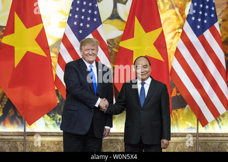 U.S. President Donald Trump (L) shakes hands with Vietnamese Prime Minister Nguyen Xuan Phuc (R) during their meeting on February 27, 2019, ahead of the US-North Korea summit in Hanoi, Vietnam. The president is in the Vietnamese capital for his second summit with North Korean leader Kim Jong Un where they will discuss the denuclearization of the Korean peninsula. Photo via The White House/UPI Stock Photo
