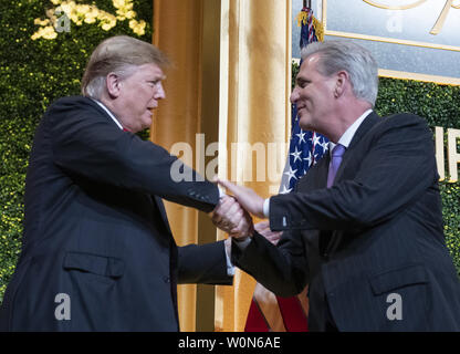 United States President Donald J. Trump, left, shakes hands with US House Minority Leader Kevin McCarthy (Republican of California), right, prior to delivering remarks at the National Republican Congressional Committee (NRCC) Spring Dinner at the National Building Museum on April 2, 2019. Photo by Ron Sachs/UPI Stock Photo