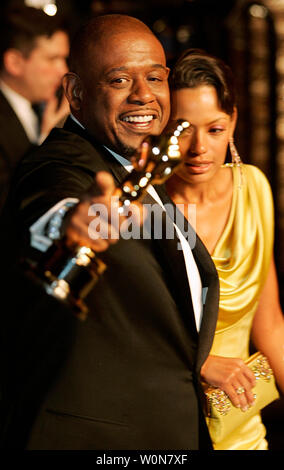 Best Actor Oscar winner Forest Whitaker (L) and his wife Keisha (R) arrive at the Vanity Fair post-79th Academy Awards party at Morton's in West Hollywood on February 25, 2007.   (UPI Photo/Gary C. Caskey) Stock Photo