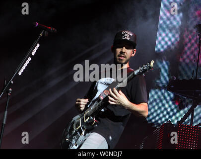 Mike Shinoda with Linkin Park performs on the opening night of their tour at the Cruzan Amphitheatre in West Palm Beach, Florida on August 8, 2014. UPI/Michael Bush Stock Photo