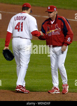 April 8, 2023: With the bases loaded, St. Louis Cardinals catcher Willson  Contreras (40), first baseman Paul Goldschmidt (46), third baseman Nolan  Arenado (28), relief pitcher Zack Thompson (57), and pitching coach