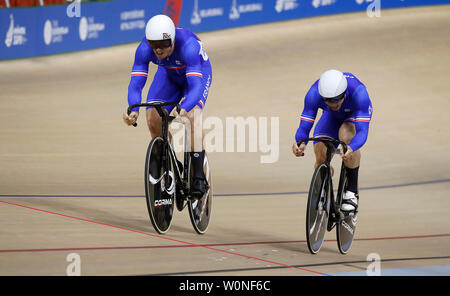 France's Quentin Caleyron and Rayan Helal on their way to silver in the Men's Team Sprint, during day seven of the European Games 2019 in Minsk. Stock Photo