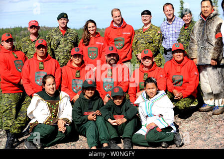 Prince William and his wife Kate, the Duke and Duchess of Cambridge (back centre) pose for a group photo with Canadian Rangers at Blachford Lake during their royal tour to Yellowknife, North West Territories, July 5, 2011.    UPI/hr/Courtesy Heritage Canada Stock Photo