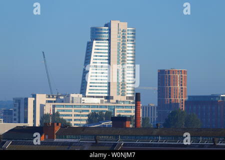 Bridgewater Place & Candle House are located at Granary Wharf in Leeds.This view is taken from a derelict building in Hunslet. Stock Photo