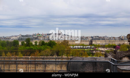 View of Paris city and Sacre Coeur Basilica on Montmartre hill in Paris France. April 2019 Stock Photo