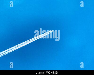 A flying plane, close-up. Stock Photo