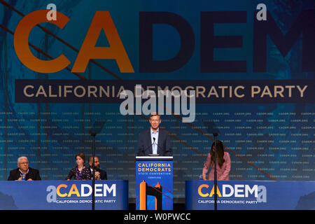 San Francisco, CA - June 01, 2019: Presidential candidate John Hickinloooper, former govenor of Colorado, speaking at the Democratic National Conventi Stock Photo