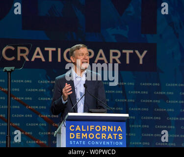 San Francisco, CA - June 01, 2019: Presidential candidate John Hickinloooper, former govenor of Colorado, speaking at the Democratic National Conventi Stock Photo