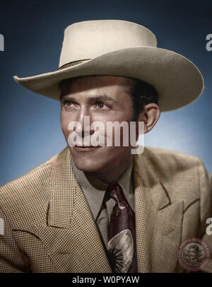 Retro-style portrait of a serious man wearing a cowboy hat and checkered suit. Captures a classic look. Hank Williams, born as Hiram King Williams on September 17, 1923, in Georgiana, Alabama, was an American singer-songwriter and musician. He is regarded as one of the most significant and influential American singers and songwriters of the 20th century. Williams began his career in music at a young age, learning guitar from African-American blues musician Rufus Payne. He started his professional career in Montgomery in the late 1930s, playing on local radio stations and at various venues. Stock Photo