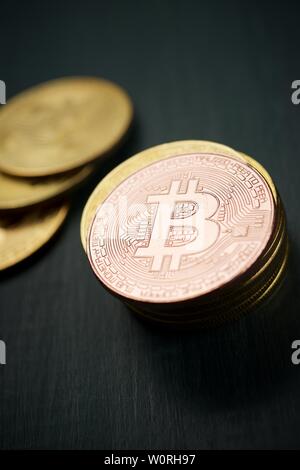 Bitcoins on a wood table. Stock Photo