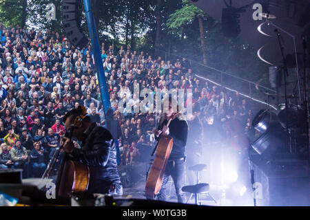 Kiel, Germany. 17th June, 2018. The Band 'Apocalyptica' is performing in the Freilichtbühne Krusenkoppel during the Kieler Woche 2018 Stock Photo