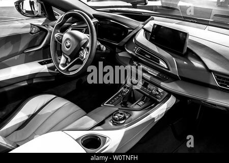 BERLIN - JUNE 09, 2018: Showroom. Interior of a plug-in hybrid sports car BMW i8 Roadster. Black and white. Stock Photo
