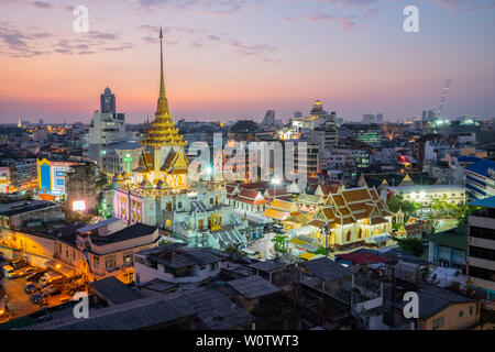 Bangkok, Thailand - November 26, 2018: Cityscape of Bangkok at Wat Trimitr, Buddhist temple, area in Bangkok, Thailand