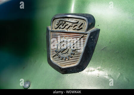BERLIN - MAY 05, 2018: The emblem of full-size pickup truck Ford F-100, 1953. Close-up. Stock Photo