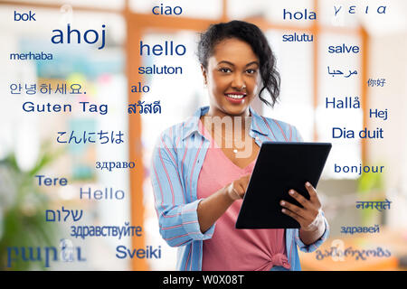 happy african american woman using tablet pc Stock Photo