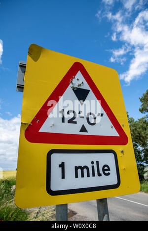 Rural crime, road signs shot and damaged by criminals/vandals. Rural crime / Gun crime escalation in England. Oxfordshire countryside, Bicester UK. Stock Photo