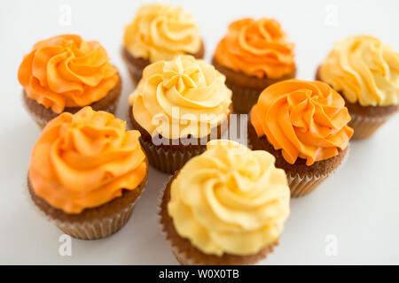 cupcakes with frosting on white background Stock Photo