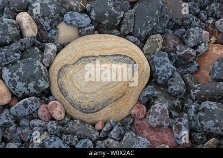 Coloured Pebbles on the beach at Rackwick Bay Hoy Scotland Stock Photo