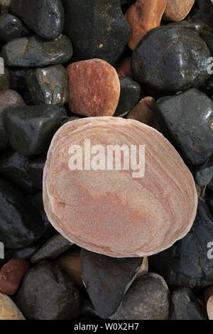 Coloured Pebbles on the beach at Rackwick Bay Hoy Scotland Stock Photo