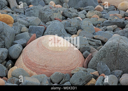Coloured Pebbles on the beach at Rackwick Bay Hoy Scotland Stock Photo