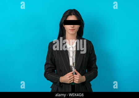 GDPR - woman looking at camera but her face is hidden. Cyber security. medium shot Stock Photo