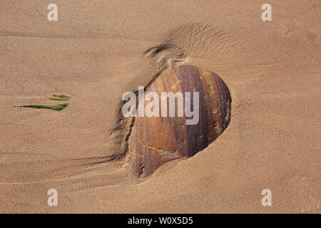 Coloured Pebbles on the beach at Rackwick Bay Hoy Scotland Stock Photo