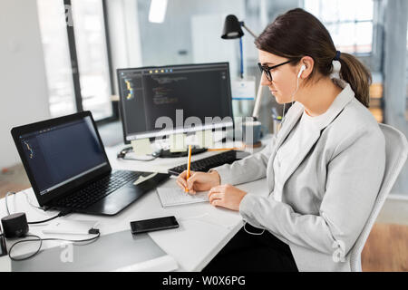 businesswoman with notebook working at office Stock Photo