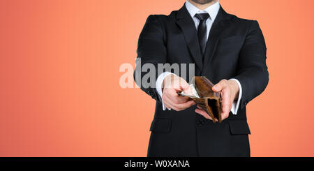 Unrecognizable businessman showing you empty wallet. Business concept Stock Photo