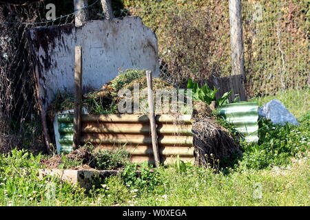 Fence made of wooden poles Stock Photo - Alamy